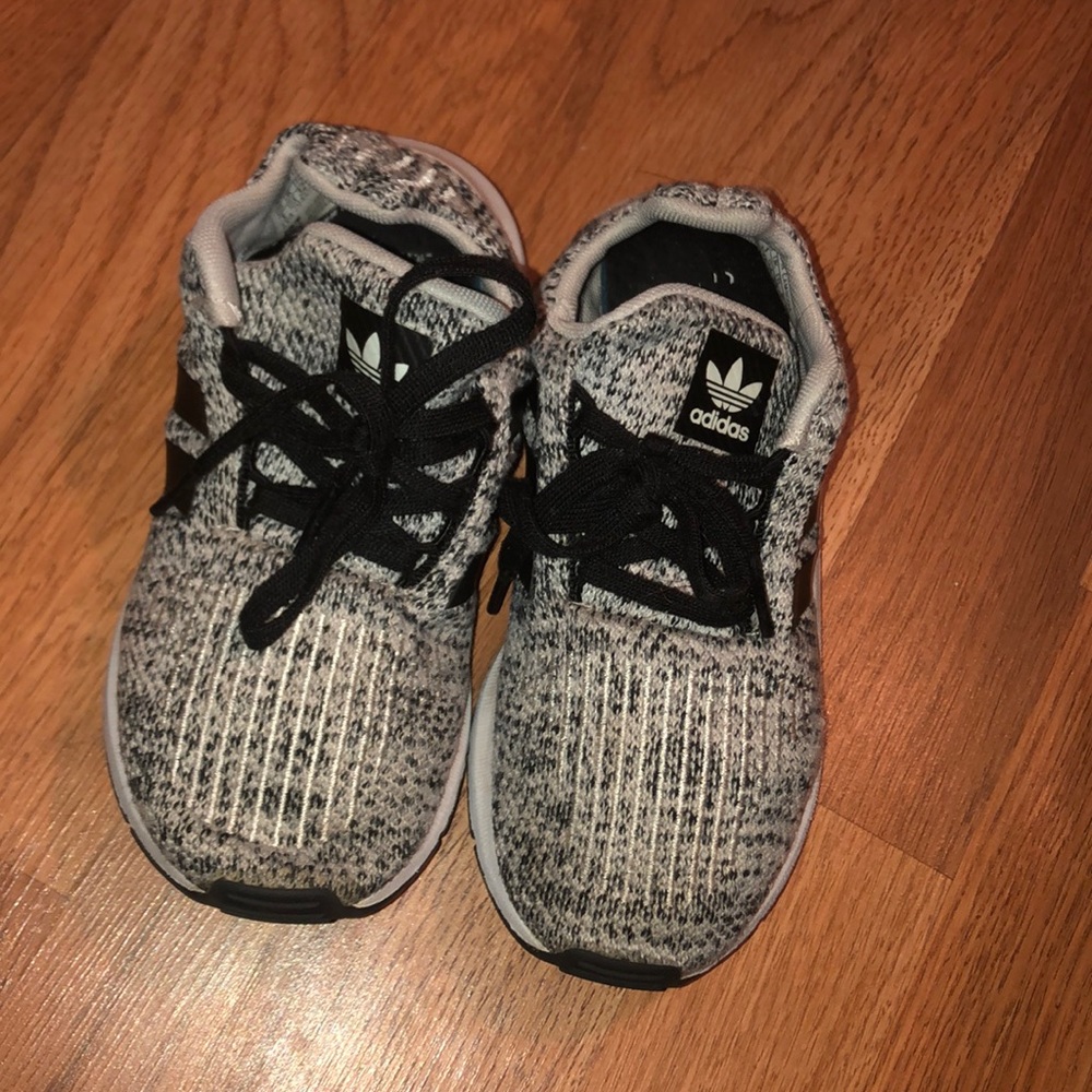 Black and gray Adidas